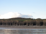 SX25191 Caves in cliffs Llantwit Major beach.jpg